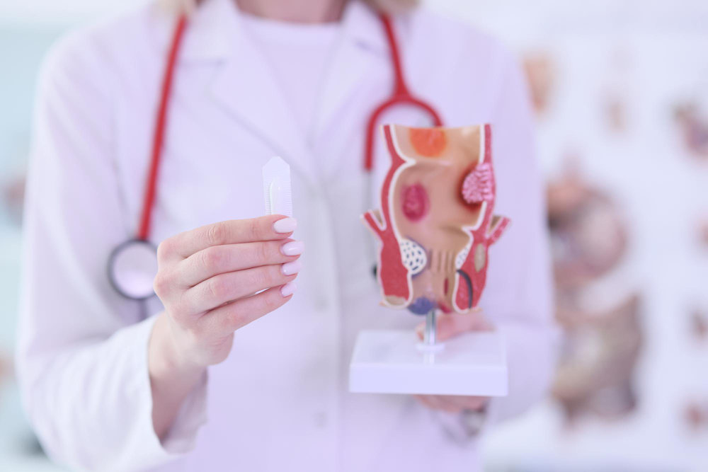 young-female-doctor-with-stethoscope-shows-picture-sick-rectum-specialist-warns-about-danger Saumya Rathi